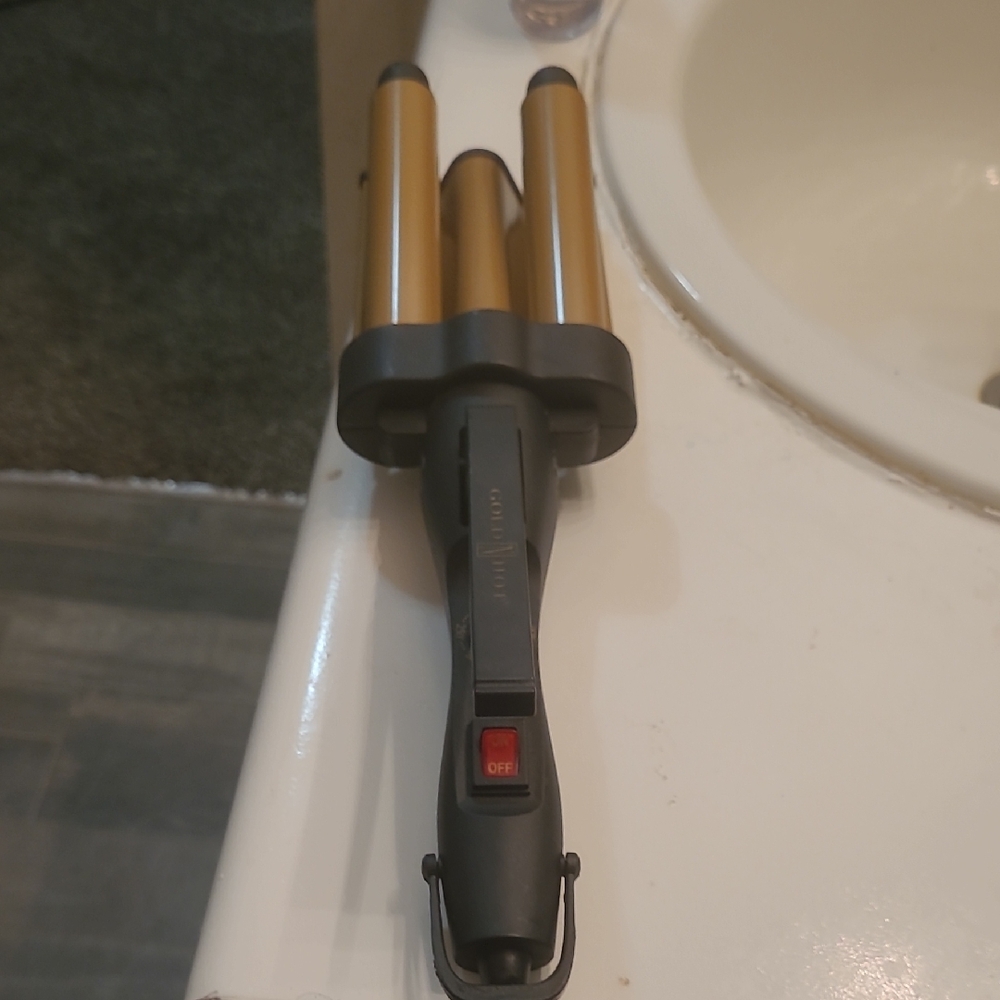 Gold and Black Hair Styling Tool